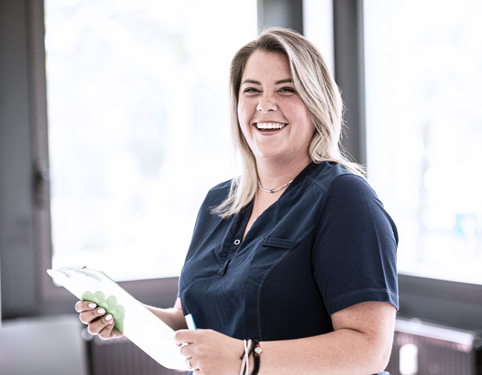 Receptionist with appointment book Receptionist with appointment book